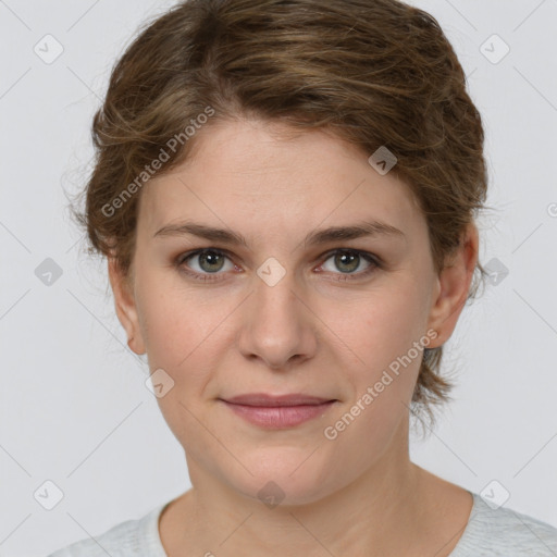 Joyful white young-adult female with medium  brown hair and green eyes