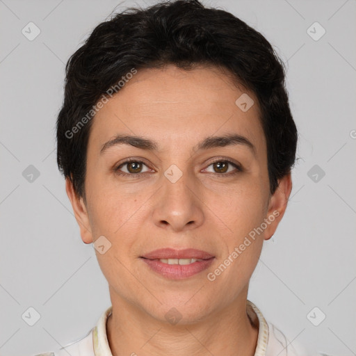 Joyful white adult female with short  brown hair and brown eyes