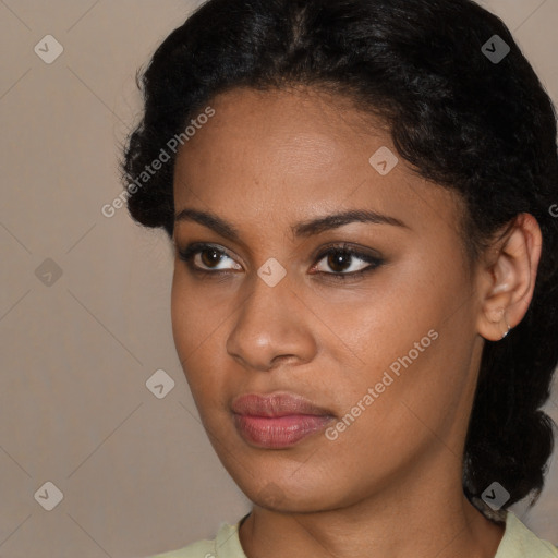 Neutral black young-adult female with short  black hair and brown eyes