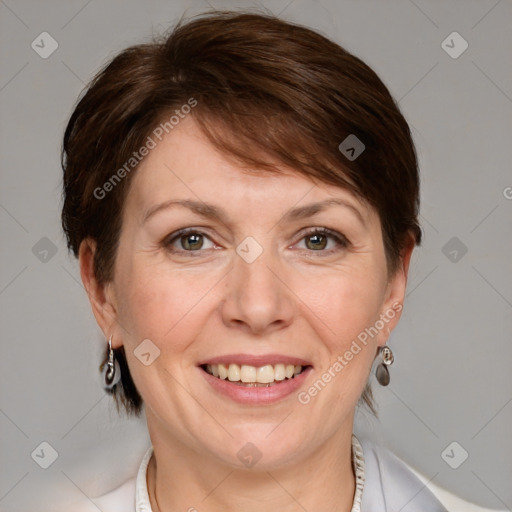 Joyful white adult female with medium  brown hair and grey eyes