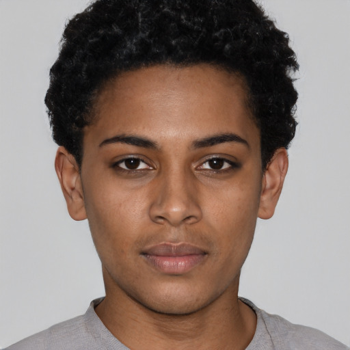 Neutral black young-adult female with short  black hair and brown eyes