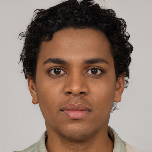 Neutral black young-adult male with short  brown hair and brown eyes