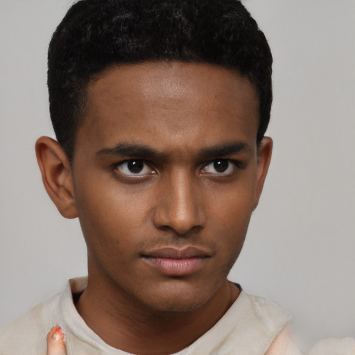 Neutral black young-adult male with short  brown hair and brown eyes