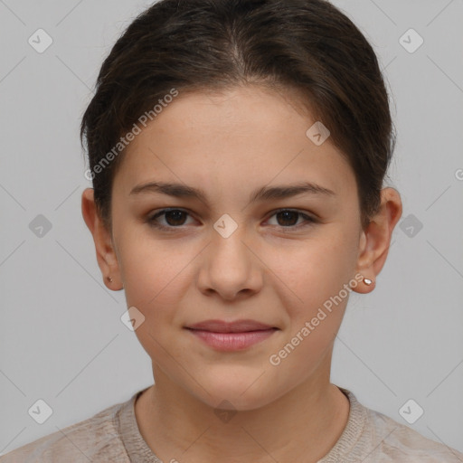 Joyful white child female with short  brown hair and brown eyes