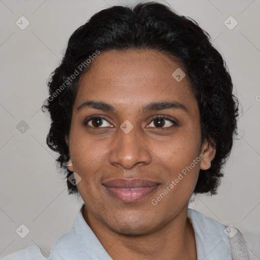 Joyful latino adult female with short  brown hair and brown eyes