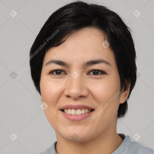 Joyful asian young-adult female with medium  black hair and brown eyes