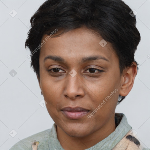 Joyful asian adult female with short  brown hair and brown eyes