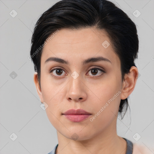 Neutral white young-adult female with short  brown hair and brown eyes