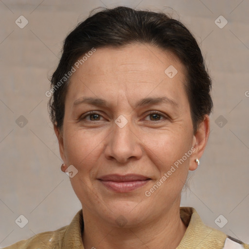 Joyful white adult female with short  brown hair and brown eyes