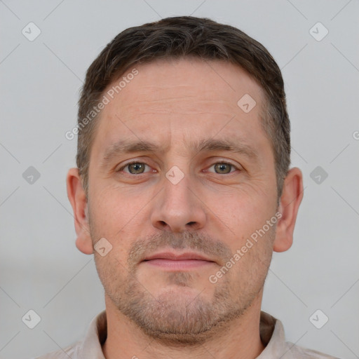 Neutral white adult male with short  brown hair and brown eyes