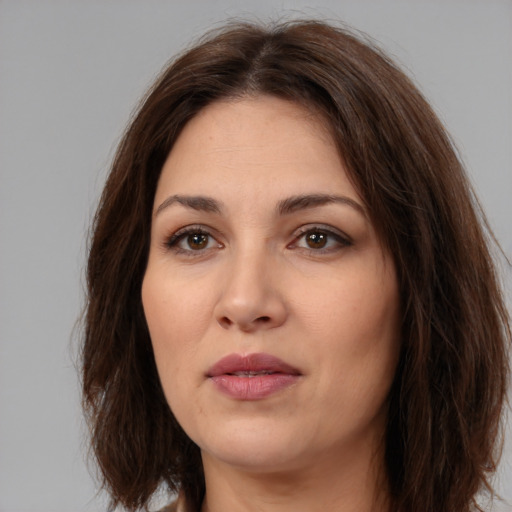 Neutral white young-adult female with medium  brown hair and brown eyes