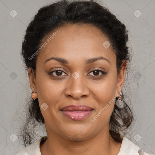 Joyful latino adult female with medium  brown hair and brown eyes