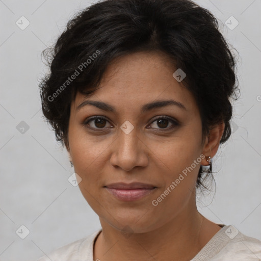 Joyful latino young-adult female with short  brown hair and brown eyes