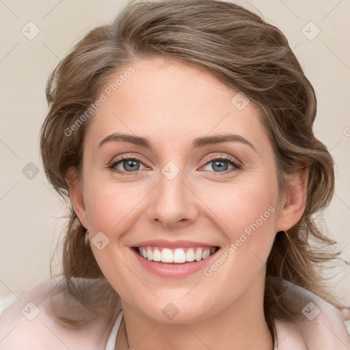 Joyful white young-adult female with medium  brown hair and blue eyes