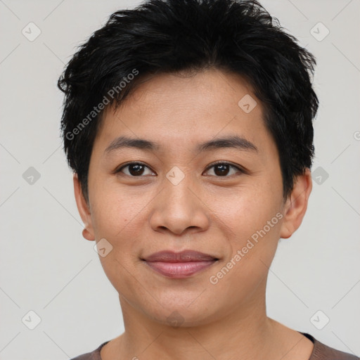 Joyful asian young-adult female with short  black hair and brown eyes