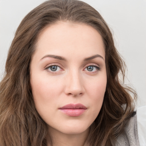 Neutral white young-adult female with long  brown hair and grey eyes