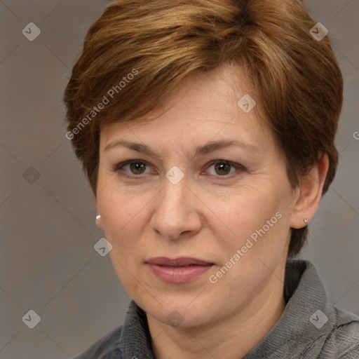 Joyful white adult female with medium  brown hair and brown eyes