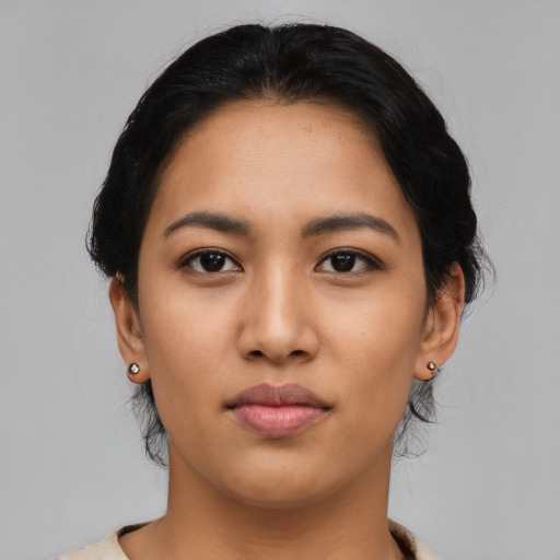 Neutral latino young-adult female with medium  black hair and brown eyes