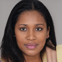 Joyful asian young-adult female with long  brown hair and brown eyes