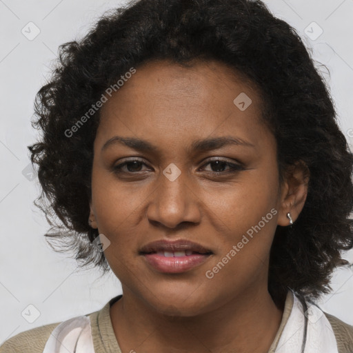 Joyful black young-adult female with medium  brown hair and brown eyes