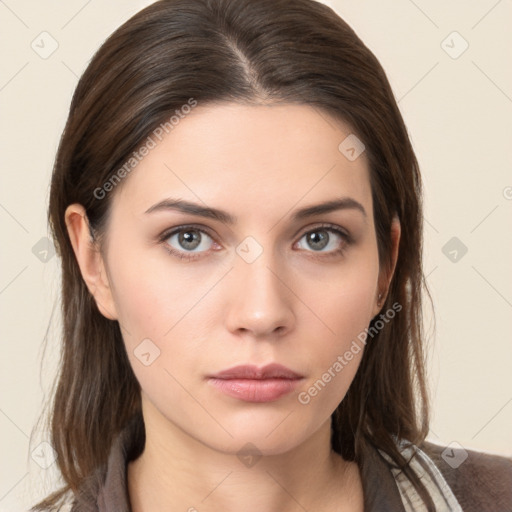 Neutral white young-adult female with medium  brown hair and brown eyes