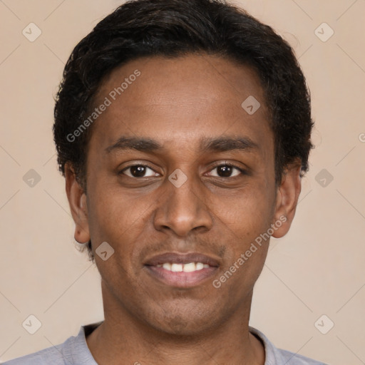 Joyful latino young-adult male with short  black hair and brown eyes