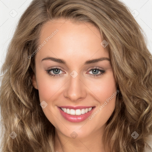 Joyful white young-adult female with long  brown hair and green eyes