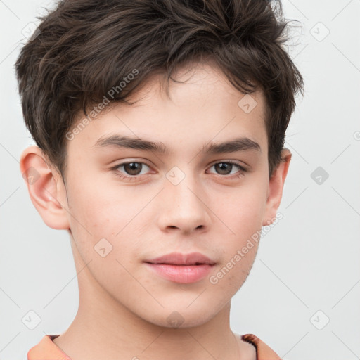 Joyful white child male with short  brown hair and brown eyes