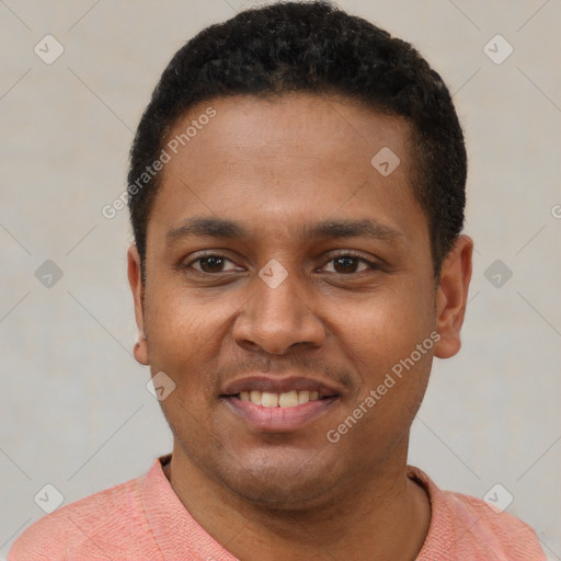Joyful latino young-adult male with short  black hair and brown eyes