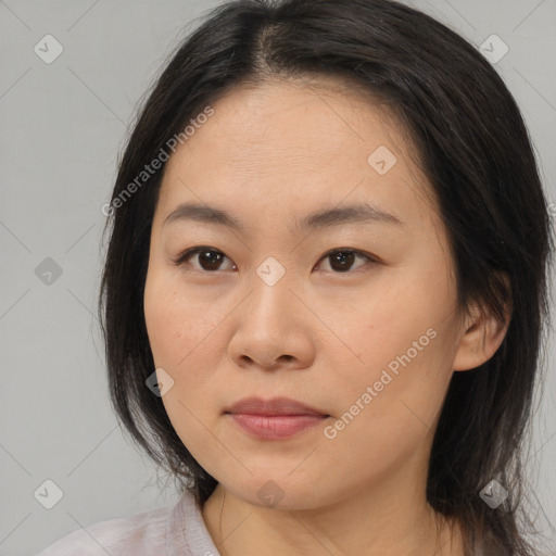 Joyful asian young-adult female with medium  brown hair and brown eyes