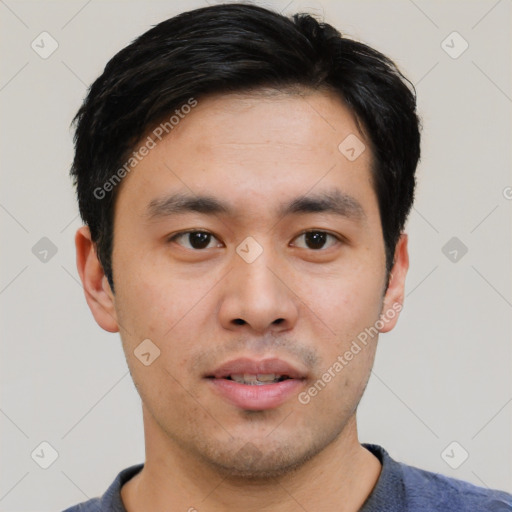 Neutral white young-adult male with short  black hair and brown eyes