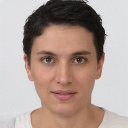 Neutral white young-adult female with short  brown hair and brown eyes