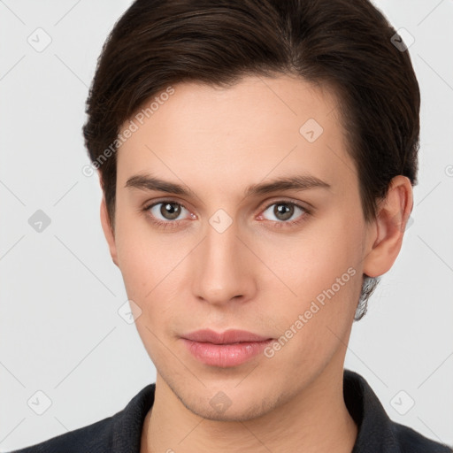 Neutral white young-adult male with short  brown hair and brown eyes