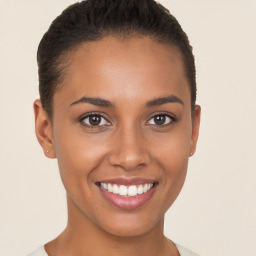 Joyful white young-adult female with short  brown hair and brown eyes