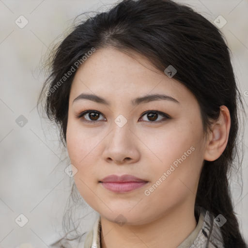 Joyful asian young-adult female with long  brown hair and brown eyes