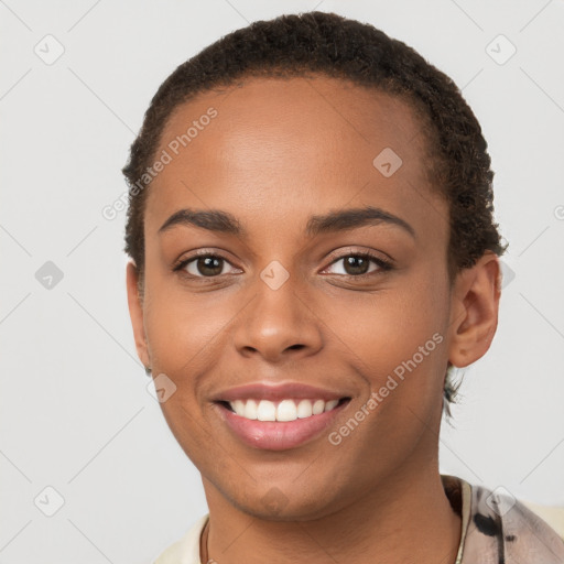 Joyful latino young-adult female with short  brown hair and brown eyes