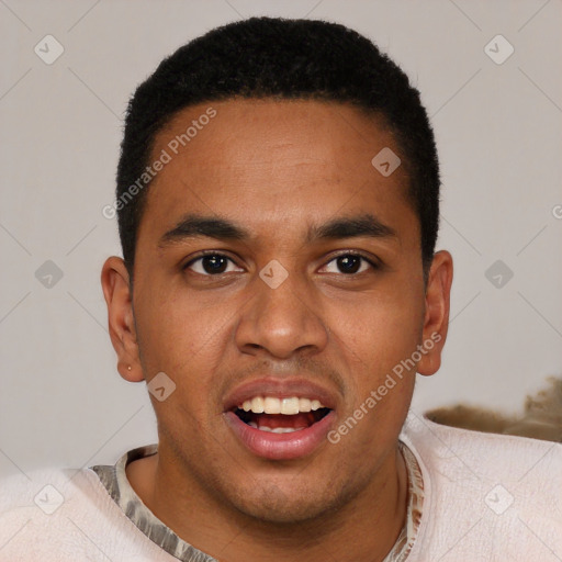 Joyful black young-adult male with short  brown hair and brown eyes
