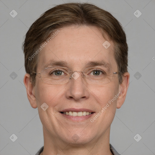 Joyful white adult male with short  brown hair and grey eyes