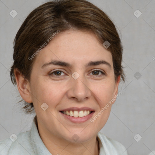 Joyful white adult female with medium  brown hair and brown eyes