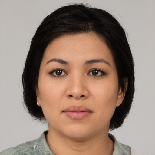 Neutral asian young-adult female with medium  black hair and brown eyes
