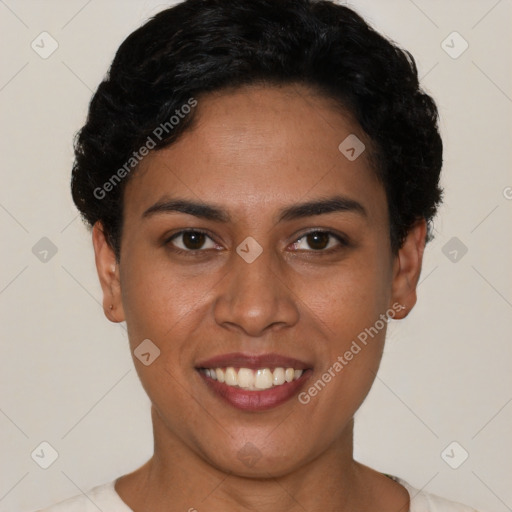 Joyful latino young-adult female with short  black hair and brown eyes