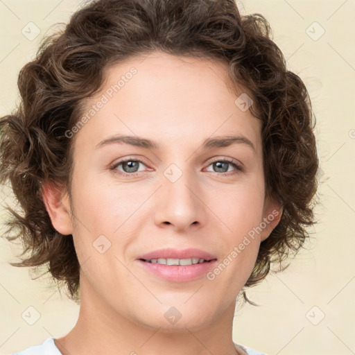 Joyful white young-adult female with medium  brown hair and green eyes