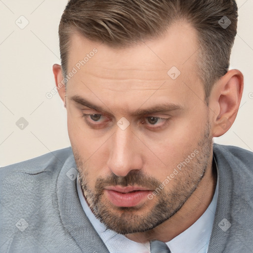 Neutral white adult male with short  brown hair and brown eyes