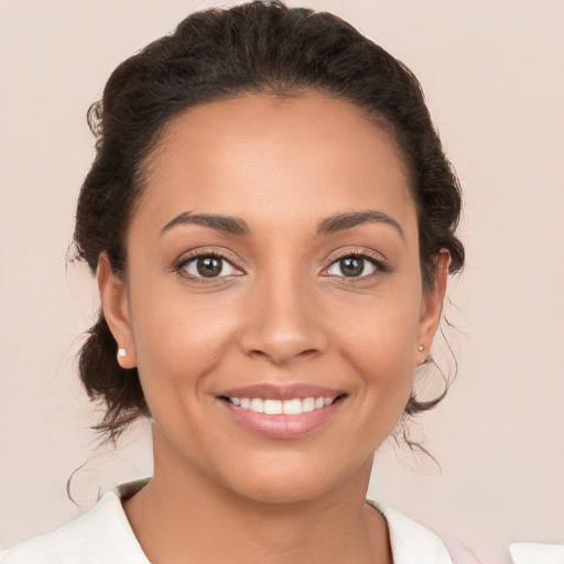 Joyful white young-adult female with medium  brown hair and brown eyes