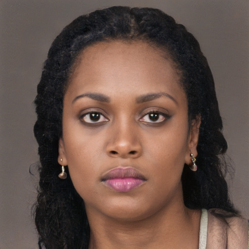 Neutral black young-adult female with long  black hair and brown eyes
