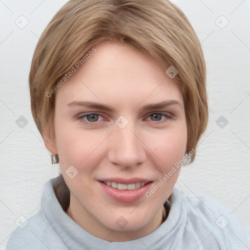 Joyful white young-adult female with short  brown hair and blue eyes