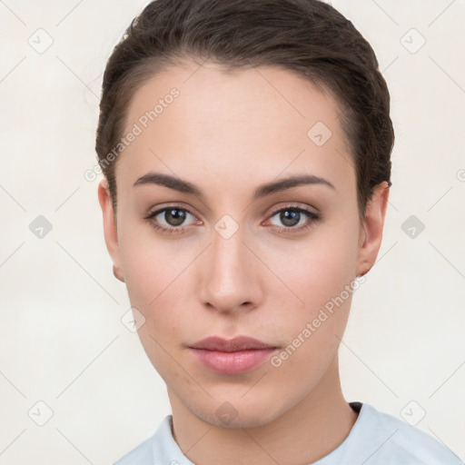 Neutral white young-adult female with short  brown hair and brown eyes