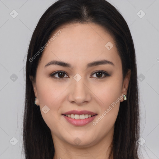 Joyful latino young-adult female with long  brown hair and brown eyes