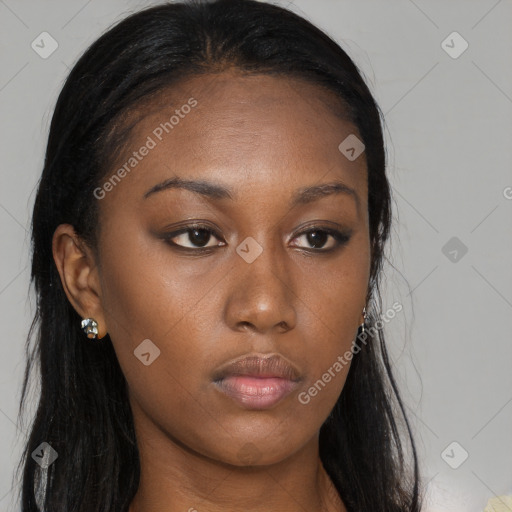 Neutral black young-adult female with long  brown hair and brown eyes