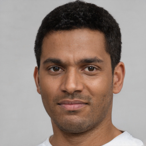 Neutral black young-adult male with short  black hair and brown eyes